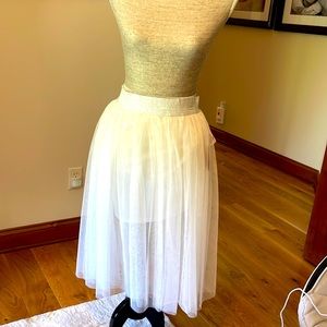 White tulle ballerina type skirt with silver electric band